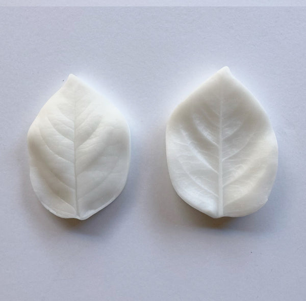 Rose Leaf Mold Small  Capture delicate rose leaves texture every time while capturing the exact size, thickness, and shape.  This mold offers a superior clay crafting experience. Create unique shapes with ease and take your creativity to the next level! Realistic flower petals and leaves for CLAYCRAFT BY DECO CLAY as well as sugar flowers and